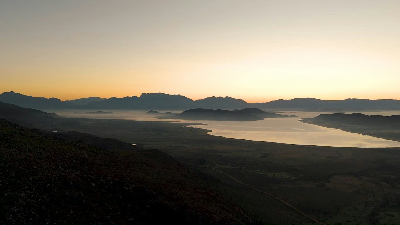 Sunrise over the mountains and lake at Klipbokkop, from Marko De Beer’s Mahindra film